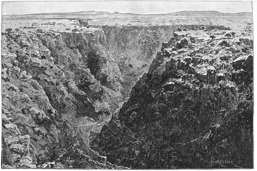 EXPEDITION WINDING UP THE GORGE OF KARYA-MUHORO. EXPEDITION WINDING UP THE GORGE OF KARYA-MUHORO.